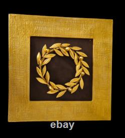 Gold colour Olive Wreath on a black Leather and Gold Frame