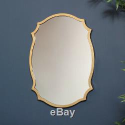 Gold wall mirror decorative shaped metal frame vintage luxe living room hallway
