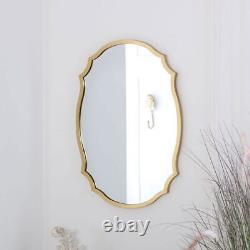 Gold wall mirror decorative shaped metal frame vintage luxe living room hallway