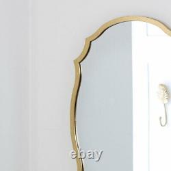 Gold wall mirror decorative shaped metal frame vintage luxe living room hallway