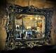 Large Ornate Black and Gold Framed Mirror with Bevelled Glass