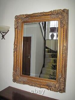 Mirror -large decorative wall type in dark gold