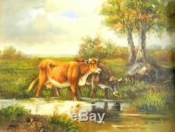 Tall beveled glass wall mirror in gold wood frame cow painting on board