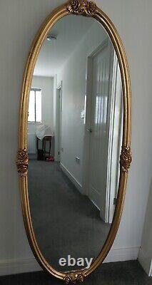 Very large, stunning period-style, ornate gilt-framed oval wall mirror
