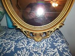 Vintage Syroco 31x16 Gold Ornate Framed Wall Mirror Hollywood Regency Urn Flower