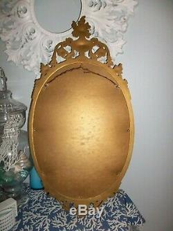 Vintage Syroco 31x16 Gold Ornate Framed Wall Mirror Hollywood Regency Urn Flower