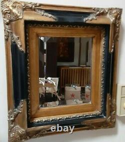 Vintage wall mirror is small but very stylish and beautiful frame black and gold
