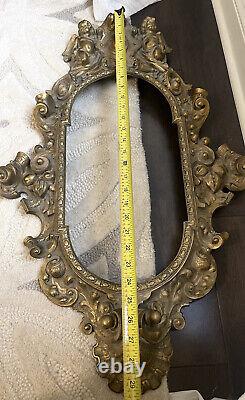 Vtg Ornate Gold Metal Mirror Or Painting Or Picture frame Wall Art cherub Motif