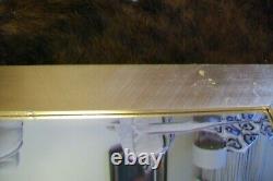Wall mirror in golden wooden frame. 79 x 109 cm. Used. RRP around 500 £